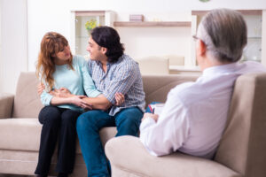 Young pair visiting experienced doctor psychologist - Discover Tulsa Marriage Counseling