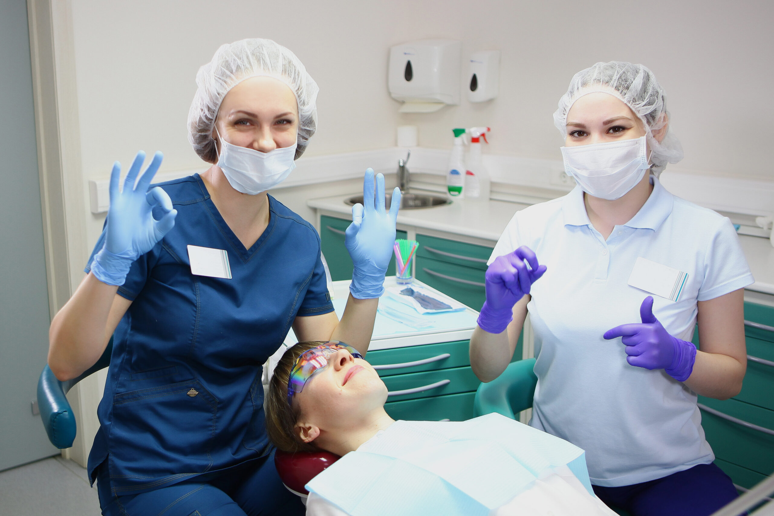 Dental team treating a patient in a modern clinic, representing the friendly and professional care offered by top 10 Tulsa dentist practices.